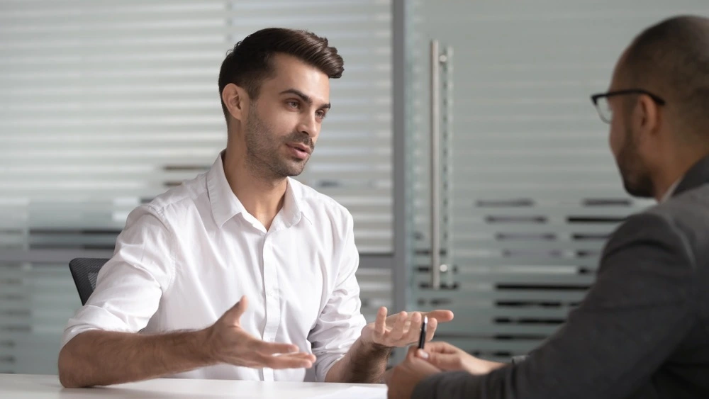Employee discussing return-to-work plan with employer